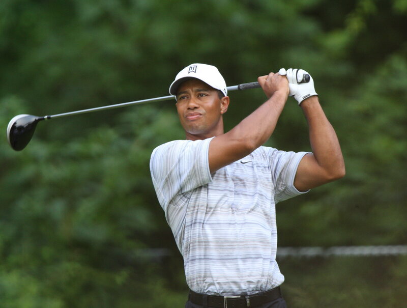 Tiger Woods, first Black golfer to win the Masters
